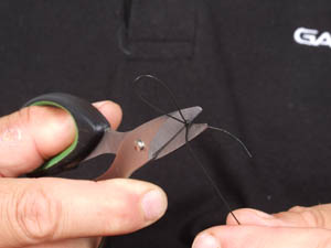 Step 4. Once the knots are securely bedded, trim of the excess from each knot.