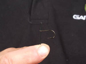 Step 6. Push the loop through the eye of the hook. We have used a size 6 Covert Chod hook, but Inczors work really well too.
