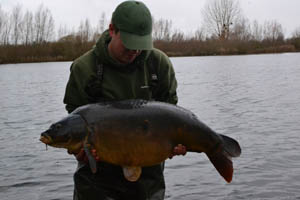 My first fish from Heron Lake was this dark mirror weighing 38lb 4oz