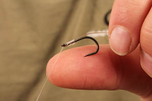 Start off with a knotless knot - for D-rigged bottom baits and our chod rig about 9 turns is about right.