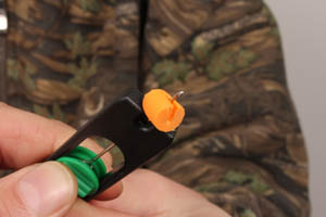 Push a baiting needle though the outsideo fthe foam so it comes through at an angle down into the slice you have made