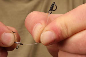 If your tying up a choddy use a simple 3 turn blood knot with the tag blobbed to attach a size 12 Covert Flexi -ring swivel.