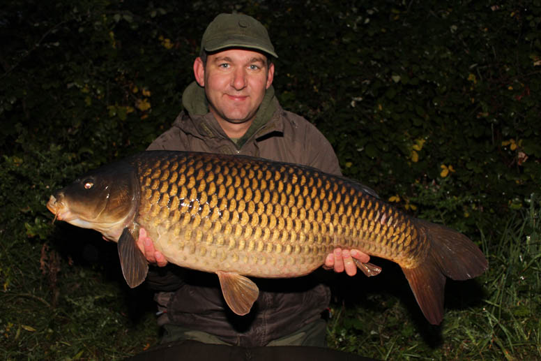 Lewis Read with a 30lb 12oz common taken on a bottom bait rig