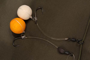 The hinged stiff rig has the Critical Mass moulded at the base of the hook section, the chod rig shown relies on the Plummet leadcore to sink it.
