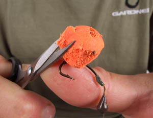 Trim away at the sides of the pop up to produce a critically balanced hook bait.