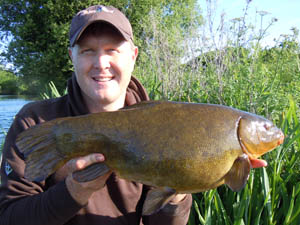 This tench weighing 7lb 6oz was part of an eight fish catch for Lee.