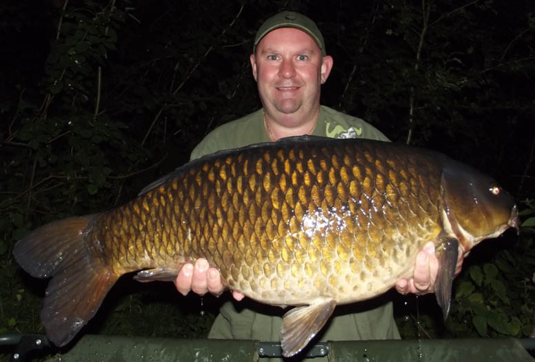After a few minutes I slipped the net under a lovely common which on the scales went 24lb 8oz.