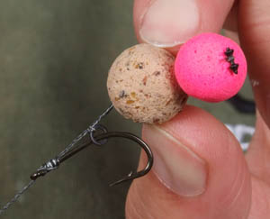 Attach a large Covert Rig Ring with a double overhand knot below the bait so it can blow back once the rig is complete. Slide the ring on to a size 6 Covert Incizor and tie the knotless knot so the ring is positioned on the bend of the hook.