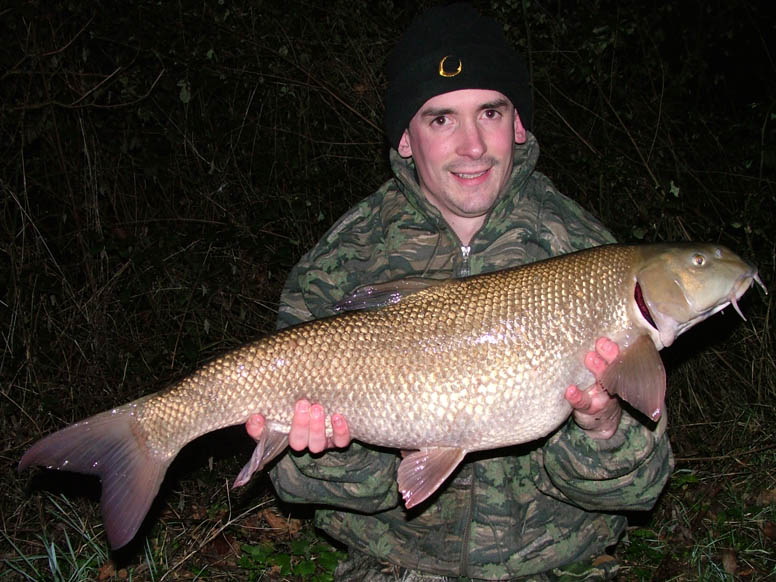 A 14lb+ barbel which fell Alan's rig.