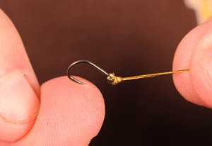 Tie a small size 16 Target Specimen hook to the length of Trickster braid using your preferred knot.