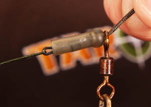 Trap the hook length in place by pushing the Kwik Lok Swivel into the XL Buffer Bead.