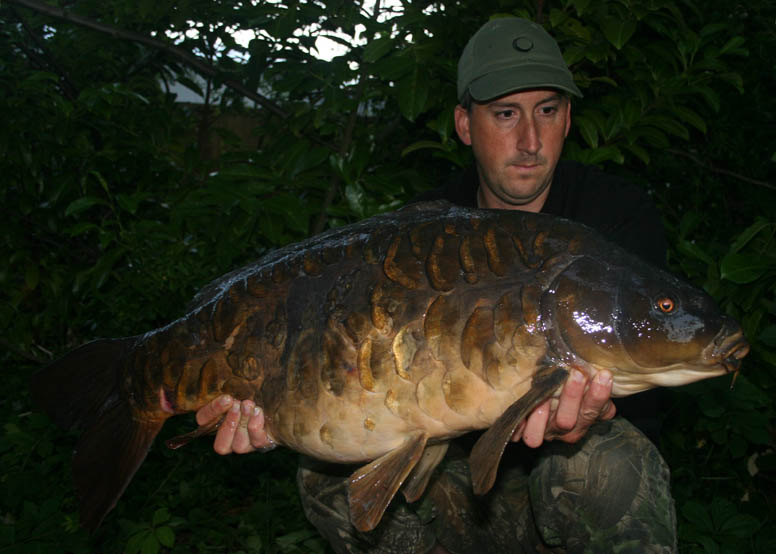 Rick Golder with one of many stunning carp he has caught.