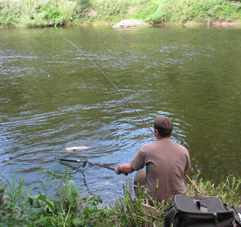Lewis Read about to slip the net under a River Wye barbel.
