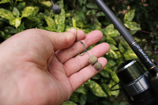 When setting margin traps in clear water Nick prefers a simple bottom bait rig.