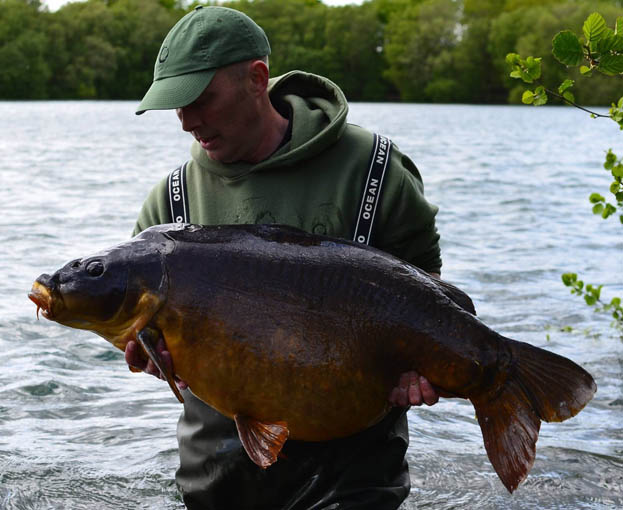 Mark has an enviable track record when it comes to big carp captures. This stunning mirror went 52lb 10oz!
