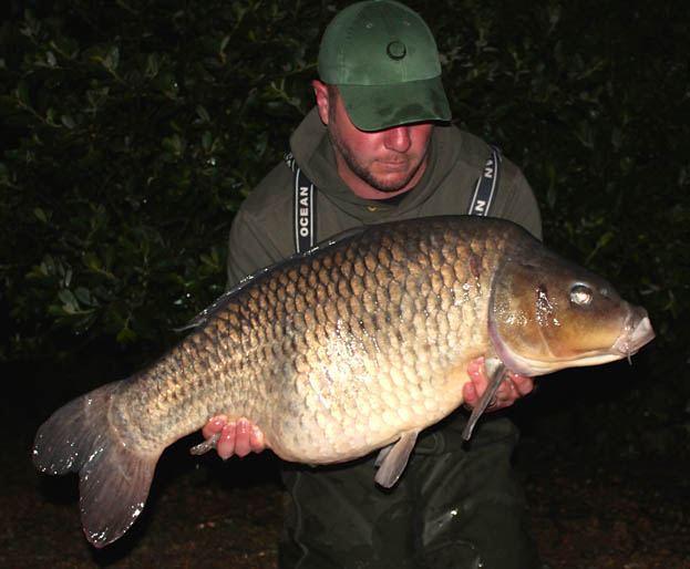 I eventually slipped the net under the fish, flicked on my head torch and could see I had the Silver Common.