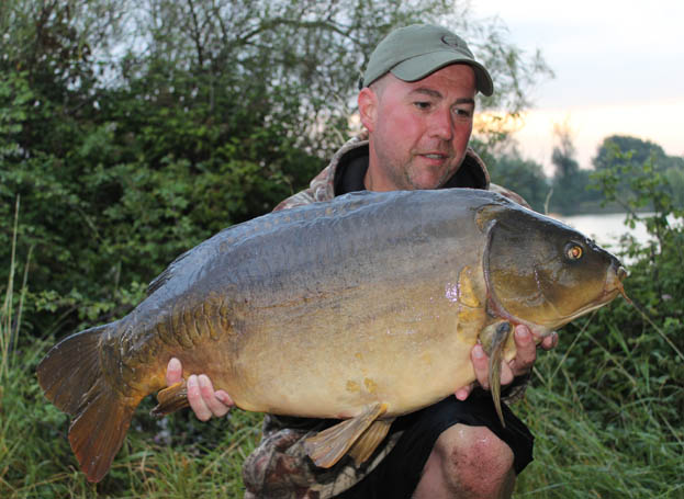 I weighed the carp and it was 27lb 8oz, a fish known as the Baby Half Lin.