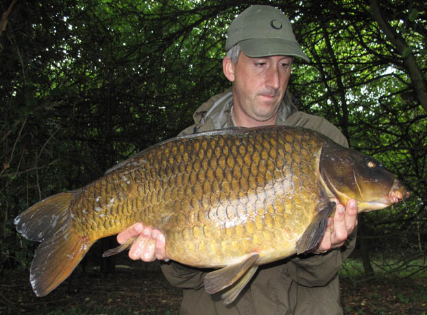 Once the weed was off the line I could see I was attached to a golden common that seemed to have a bit of ghostie in it. At 25lb it was another result on a short session and a new fish too.