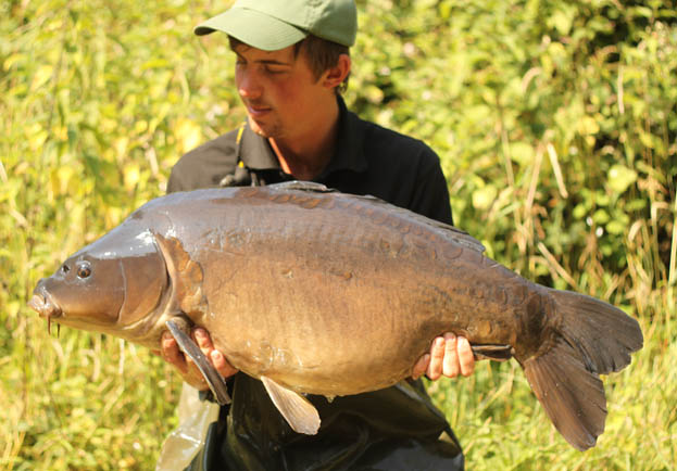 Once on the mat it wasn’t a fish we recognised and weighed 32lb on the nose and after doing a little digging it seemed the fish hadn’t been caught for a few years and was a proper rare one!