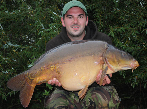 I hoisted the fish out of the water and then realised it was a bit of a unit tipping the scales round to 33lbs 12oz.