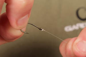 Step 4. Using a 6 inch length of 5lb Target Fluorocarbon, tie on a size 8 Covert Incizor hook.