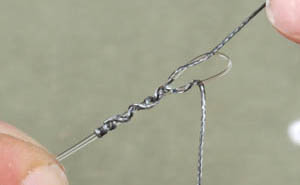 Step 4. Tie a standard knotless knot to the hook.