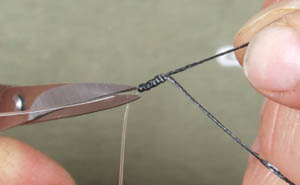 Step 5. Leave two inches off braid above the hook and connect it to Subterfuge Stiff via a allbright knot.