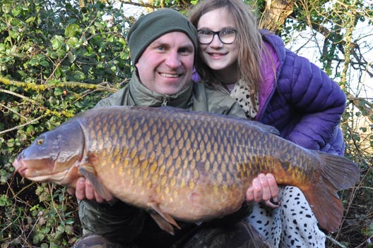 carp fishing 28lb common with livvy