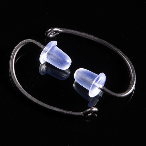 A pair of Point Protectors in translucent blue, connected by a black cord and arranged in a circle on a glossy black surface.